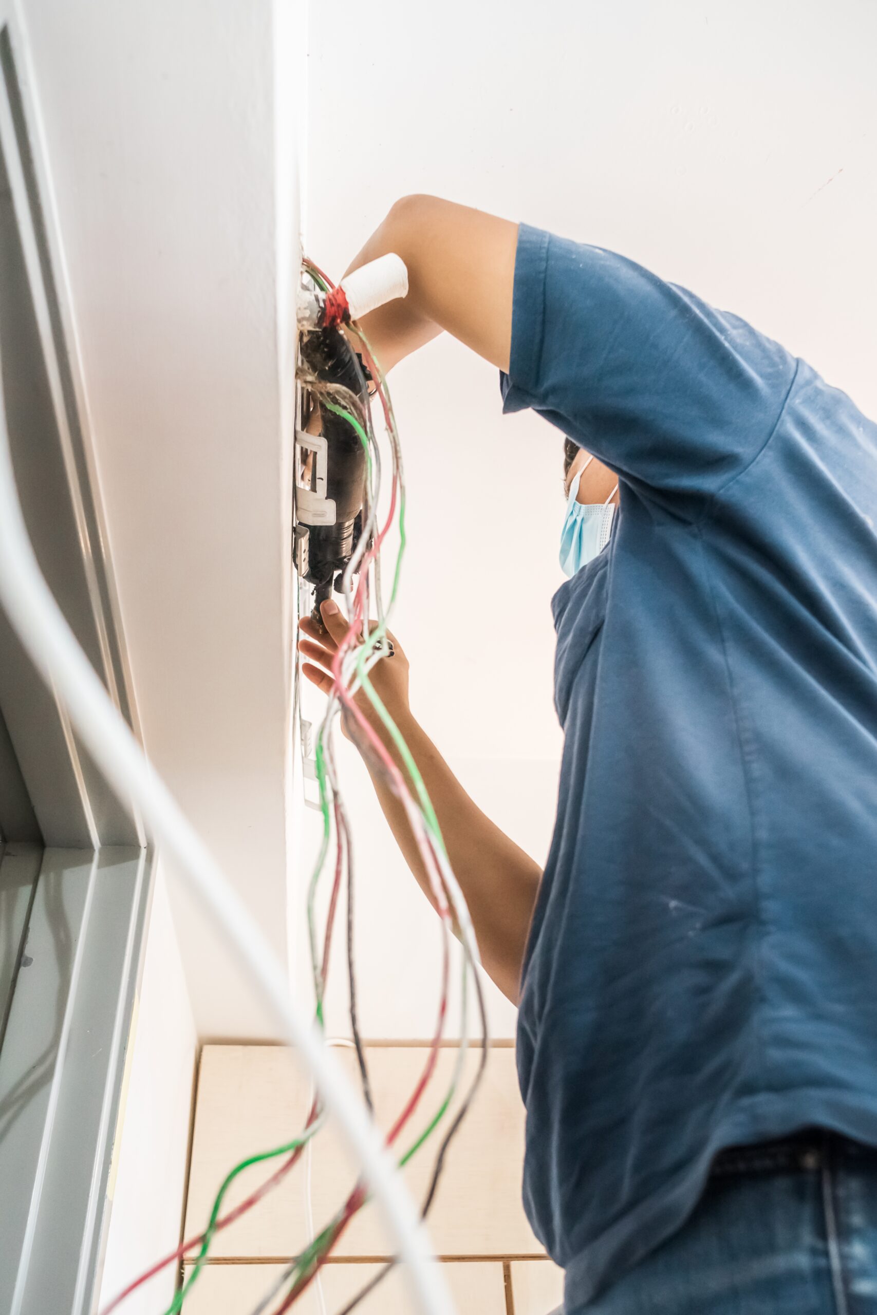 Technician repairing air conditioner